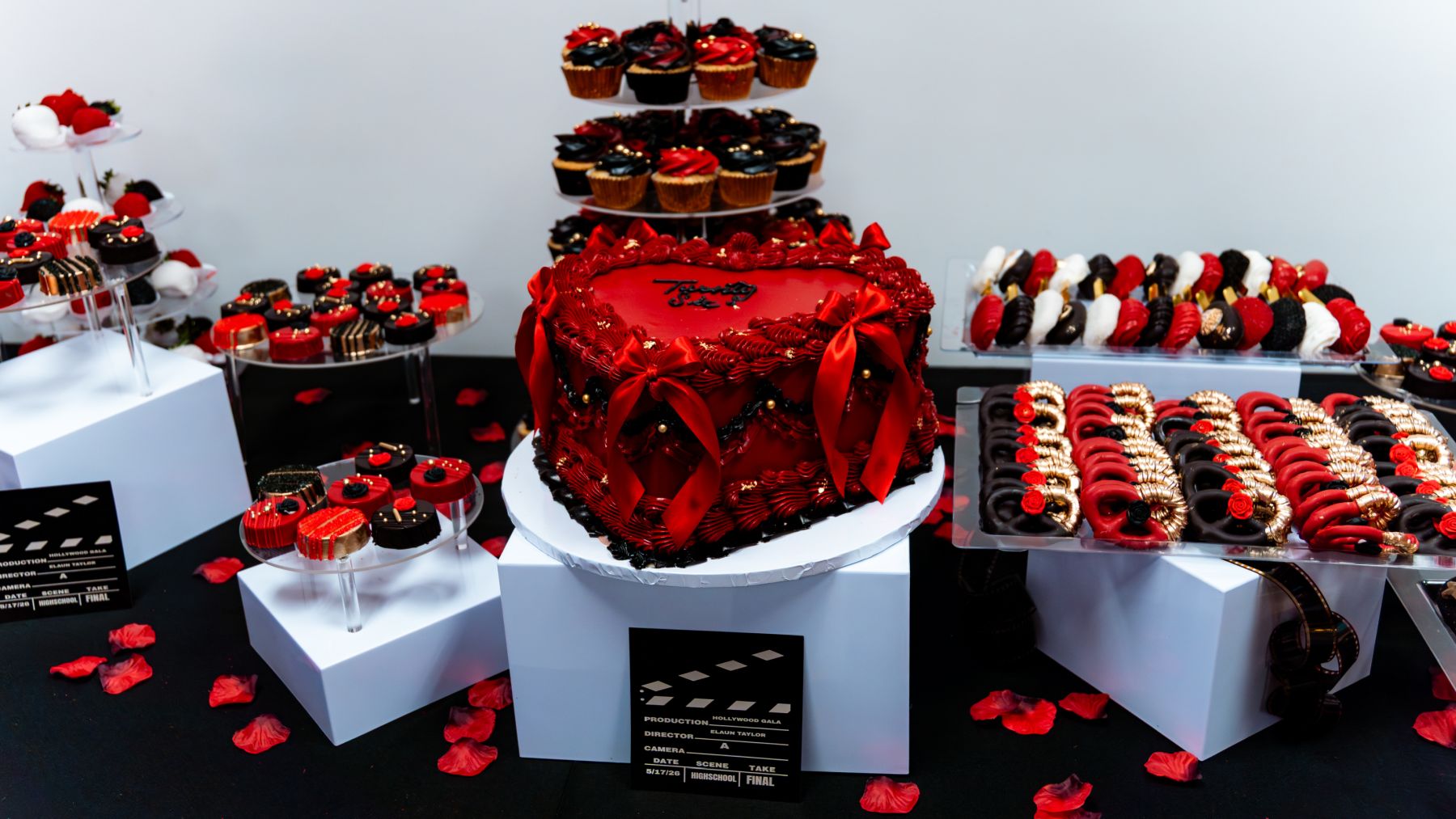 Hollywood gala detail — dessert presentation with red and black styling